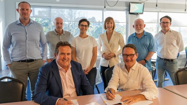 Inner West Council mayor Darcy Byrne (left), deputy mayor Jessica D‘Arienzo (centre-left), Summer Hill state MP Jo Haylen (centre) and Marrickville ward councillor Mat Howard (right) at the lease signing. President Andrew Tighe sits bottom right Picture: Nick Langley