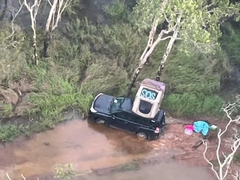 The view from above of the SOS sign atop the stuck vehicle. Pic: Supplied.