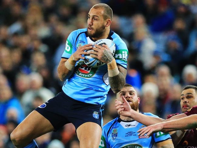 Blake Ferguson jumps up for a high ball during State of Origin III last year. Picture: Mark Evans