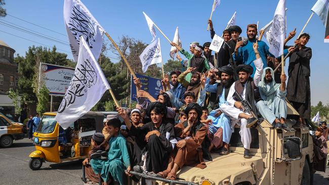 A convoy of Taliban security personnel seen moving along the streets as they celebrate the third anniversary of Taliban takeover of Afghanistan, in Herat on August 14. Picture: AFP