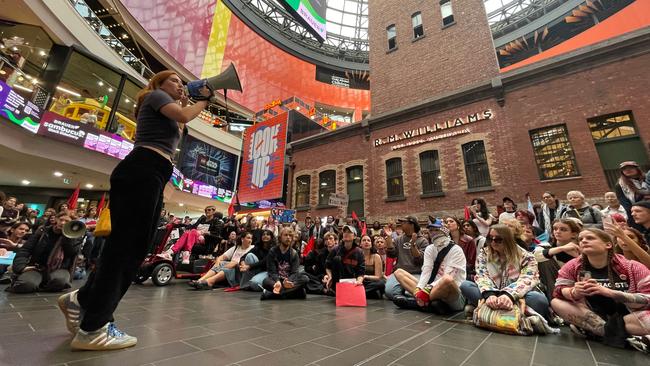 Protesters gather at Melbourne Central. Picture: Valeriu Campan