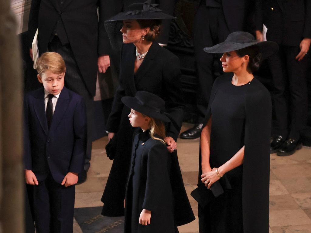 Meghan was seen waiting with Kate to join the procession. Picture: Phil Noble - WPA Pool/Getty Images