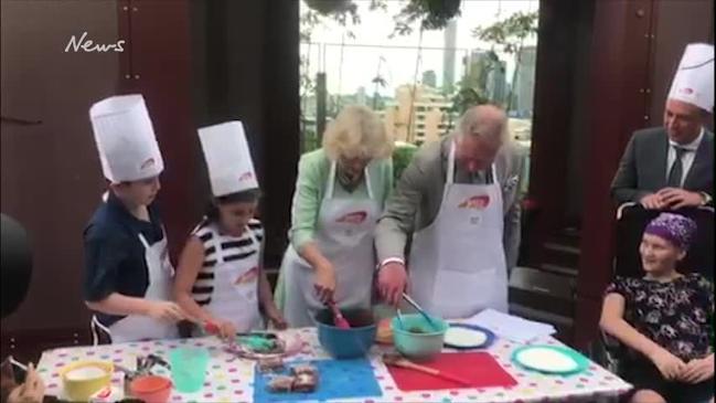 Princes Charles and the Duchess of Cornwall do a spot of cooking at Lady Cilento Children's Hospital