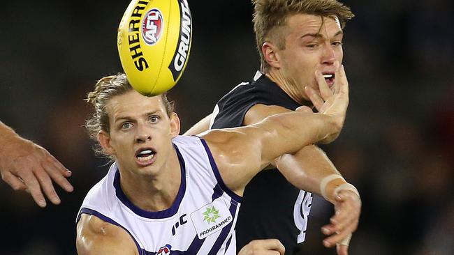 Nat Fyfe gets the upper hand on Patrick Cripps. Picture: Michael Klein