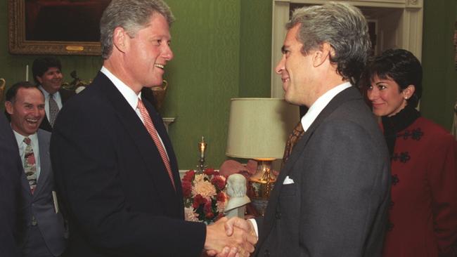 US President Bill Clinton shakes hands with Jeffrey Epstein as Ghislaine Maxwell watches on. Picture: William J. Clinton