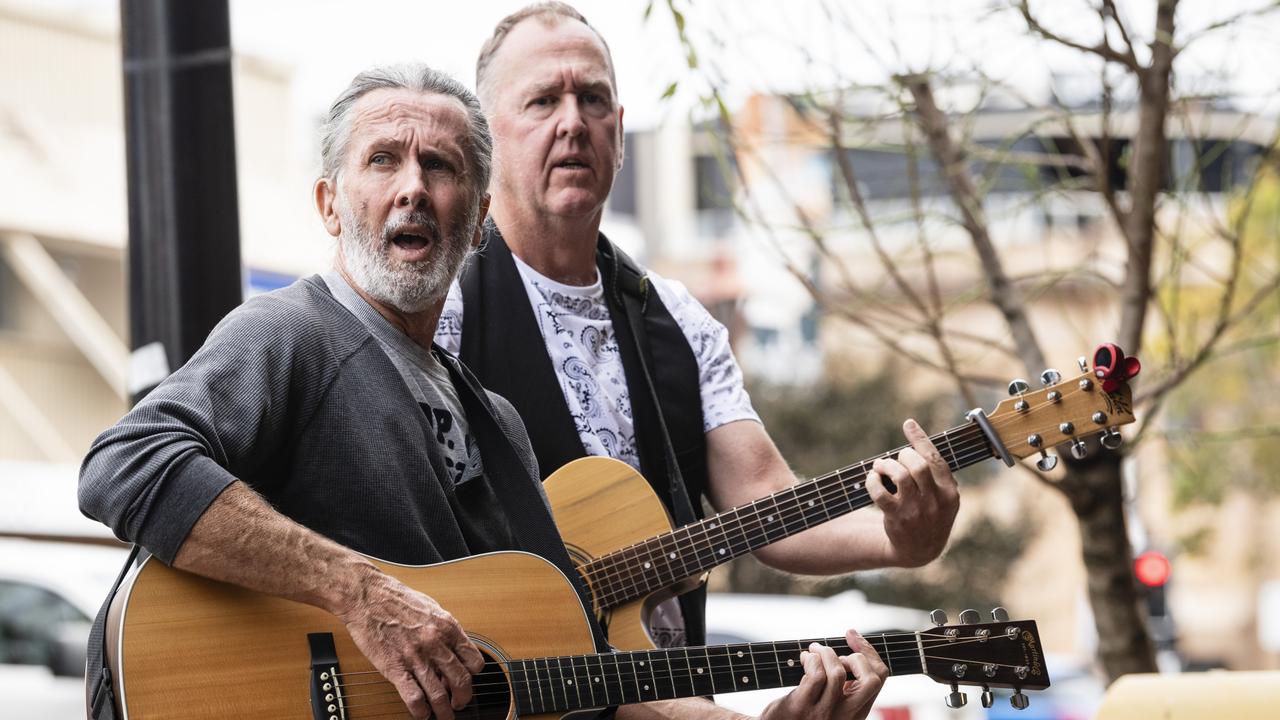 Performing as 2PZ are Paul Ryan (left) and Paul Keenan at the Toowoomba Busking Festival, Saturday, April 29, 2023. Picture: Kevin Farmer