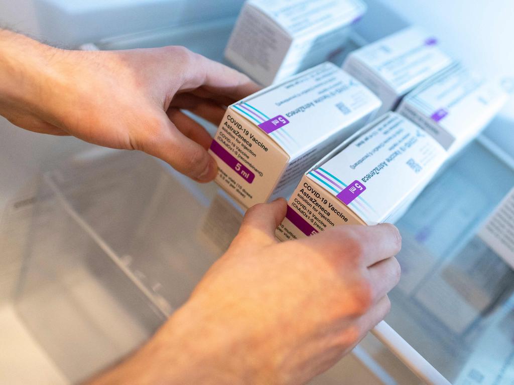 A health worker handles boxes with AstraZeneca's vaccine. Picture: AFP