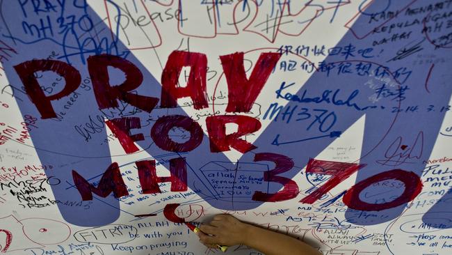 Hope lives on ...  A tribute wall at Kuala Lumpur International Airport. Pic: AFP PHOTO/ Manan Vatsyayana