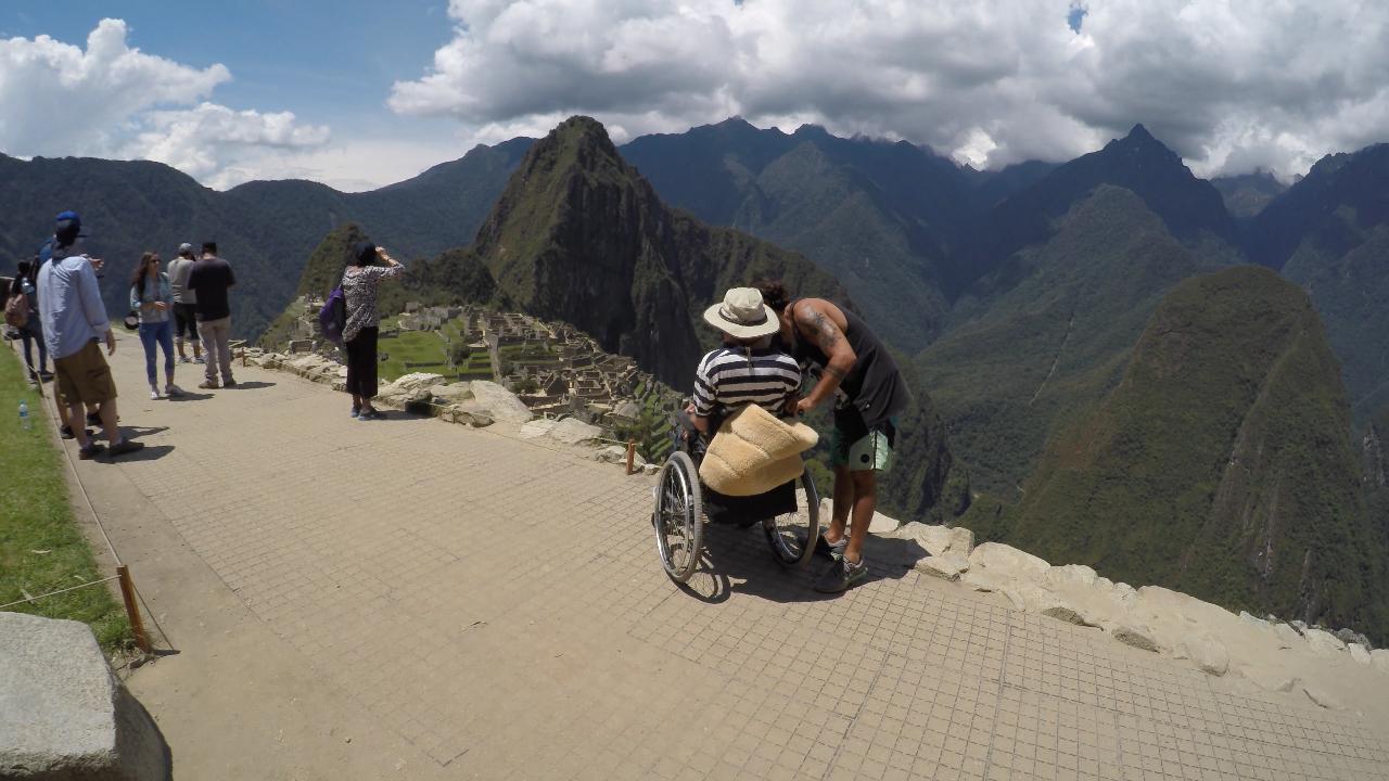 Quadriplegic Philip Stephens makes it to the top of Machu Picchu with the help of his mates