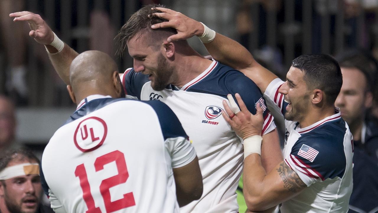 United States’ Cam Dolan celebrates his try against Canada in Vancouver.