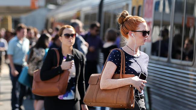 Queensland Rail commuters endured a testing time in October. Pictures: Jack Tran