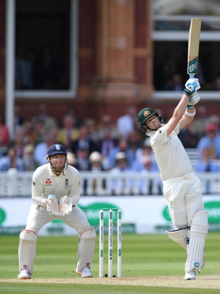 Steve Smith dances down the pitch to hammer Jack Leach for four and reahc 50. Picture: Stu Forster/Getty Images.