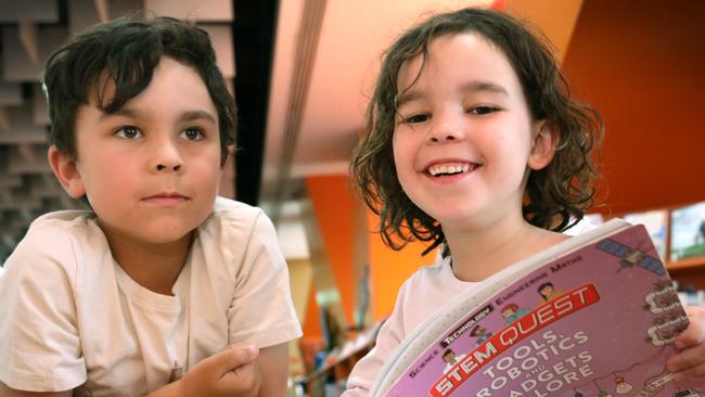 The Premier is wanting to get Nuclear programs into primary and high schools. At Marion Library, getting a head start, are brother and sister, Emilian,8, and Hira Efatmaneshnik,6. 19 March 2023. Picture Dean Martin