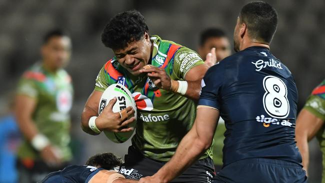 Poasa Faamausili takes on the Storm in his final game for the Warriors before switching back to the Roosters and playing Melbourne again. Picture: AAP