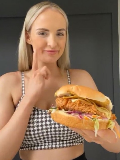 A Brisbane personal trainer has created a ‘KFC Zinger Crunch burger’ using items from Aldi. Picture: TikTok/BecHardgrave