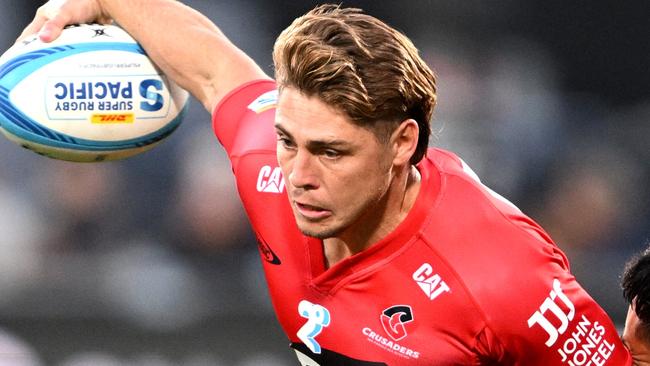 CHRISTCHURCH, NEW ZEALAND - FEBRUARY 14: James O'Connor of the Crusaders charges forward during the round one Super Rugby Pacific match between Crusaders and Hurricanes at Apollo Projects Stadium, on February 14, 2025, in Christchurch, New Zealand. (Photo by Joe Allison/Getty Images)