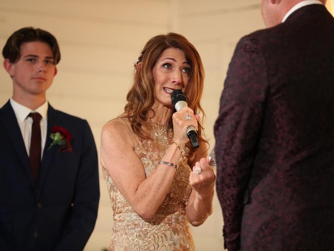 Robin Bailey getting teary and emotional during her vows to Sean Pickwell. Picture: Liam Kidston