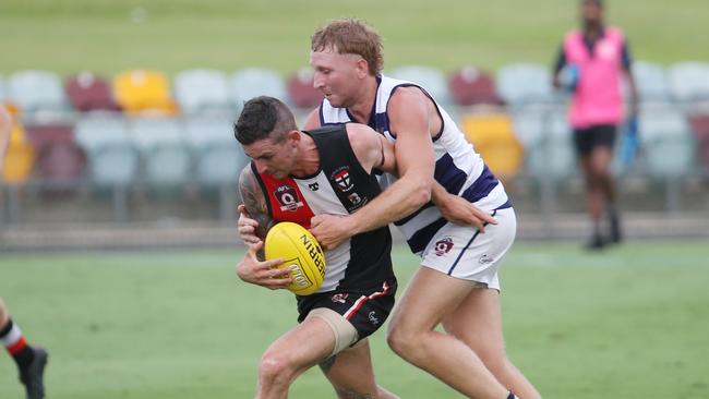 Saints' Jacob Zboril is tackled by Crocs' Nick Matthews. Picture: Brendan Radke