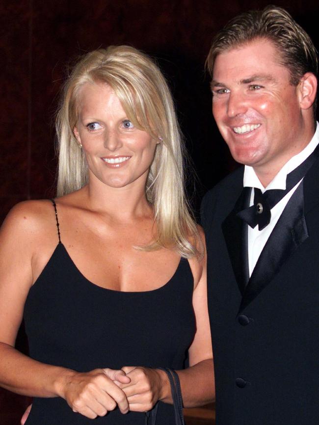 Warne with then-wife Simone.