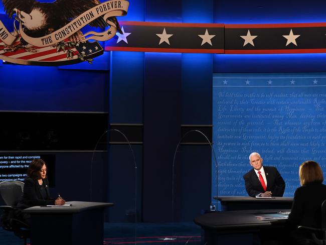 Kamala Harris (L) and Mike Pence arrive for the vice presidential debate. Picture: AFP.