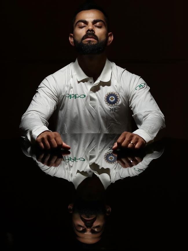 Virat Kohli basks in his own reflection, soaking in the greatness through his legendary pores.