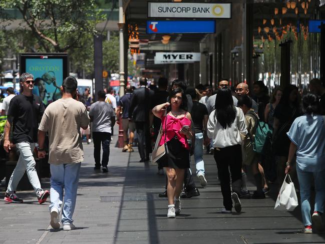 SYDNEY, AUSTRALIA - DECEMBER 06: Pedestrians and shoppers move through the Pitt Street mall on December 06, 2024 in Sydney, Australia. Australia's economy grew by 0.3% in the September quarter of 2024, marking the twelfth consecutive quarter of growth but reflecting a slowdown from previous periods, with annual growth at 0.8%. The increase was primarily driven by public sector expenditure, although household spending remained flat amid persistent inflation and high borrowing costs, prompting concerns about the overall economic momentum. (Photo by Lisa Maree Williams/Getty Images)