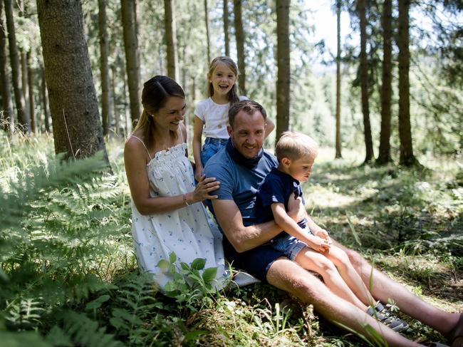 Stephanie and Michael Hall and their children Carlotta, 7, and Henri, 3. Charlie Teo travelled to Germany to operate on Michael for the worst type of brain tumour. He is still alive three years later.