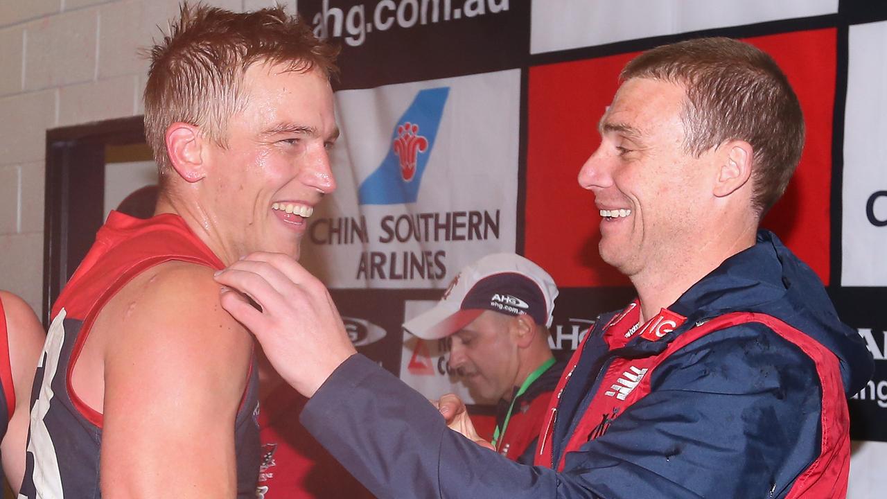 GEELONG, AUSTRALIA - JUNE 21: Bernie Vince of the Demons celebrates winning with Simon Goodwin the assistant coach of the Demons during the round 12 AFL match between the Geelong Cats and the Melbourne Demons at Simonds Stadium on June 21, 2015 in Geelong, Australia. (Photo by Quinn Rooney/Getty Images)