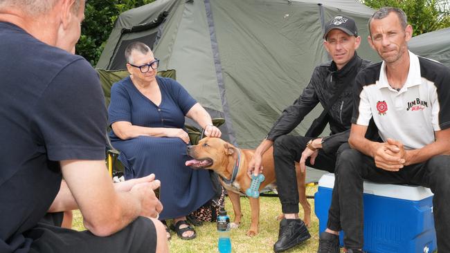 Bolivar Caravan Park - Identical twins Scott (R), and Matt Bleach, their dog Brutus, and a Craig have lived in tents for the past couple of years, but have now been offered housing,. 26 December 2024. Picture: Dean Martin