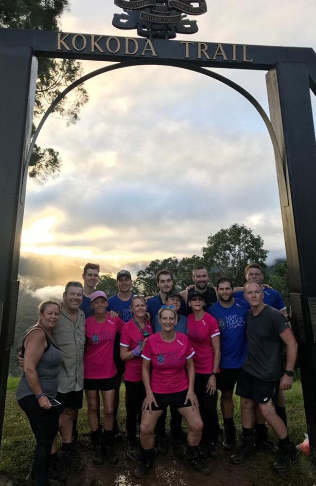 NSW Police Commissioner Mick Fuller, (far right in brown T-shirt), finished the Kokoda Trek with NSW Police Legacy.