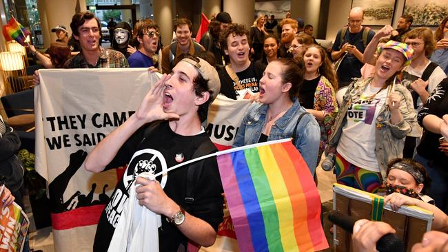 Protesters invade the foyer of the Rydges Hotel at South Bank after the One Nation AGM at the Brisbane Convention Centre last week. Photo: AAP