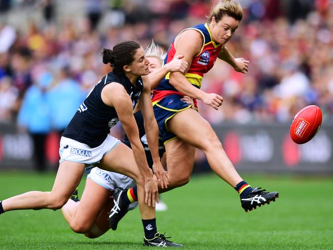 Crows vice-captain Courtney Cramey kicks under pressure during the AFLW Grand Final match between Adelaide and Carlton last year. Picture: Mark Brake/Getty Images