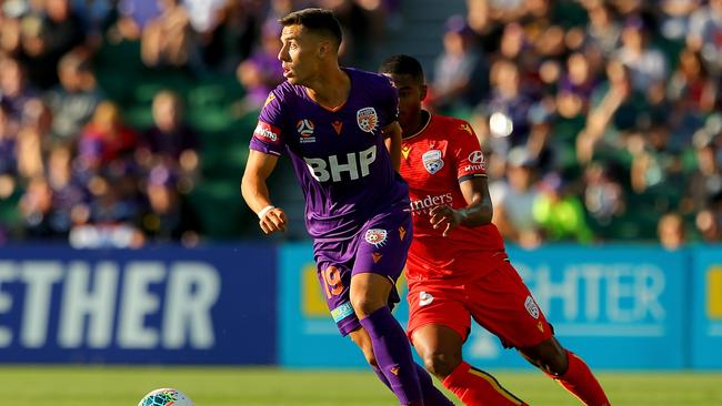 Perth Glory’s Chris Ikonomidis gets away from Adelaide United’s Michael Maria at HBF Park on Saturday. Picture: James Worsfold/Getty Images