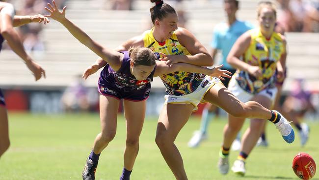 Sarah Verrier of the Dockers and Ebony Marinoff of the Crows contest for the ball during their Round 8 at Fremantle Oval on February 26, 2022 in Perth. Picture: Paul Kane/Getty Images