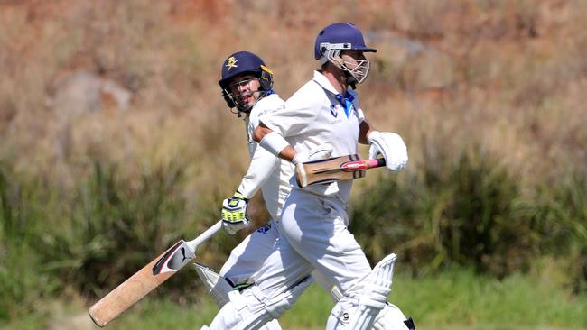 St Bernards batters running between wickets.