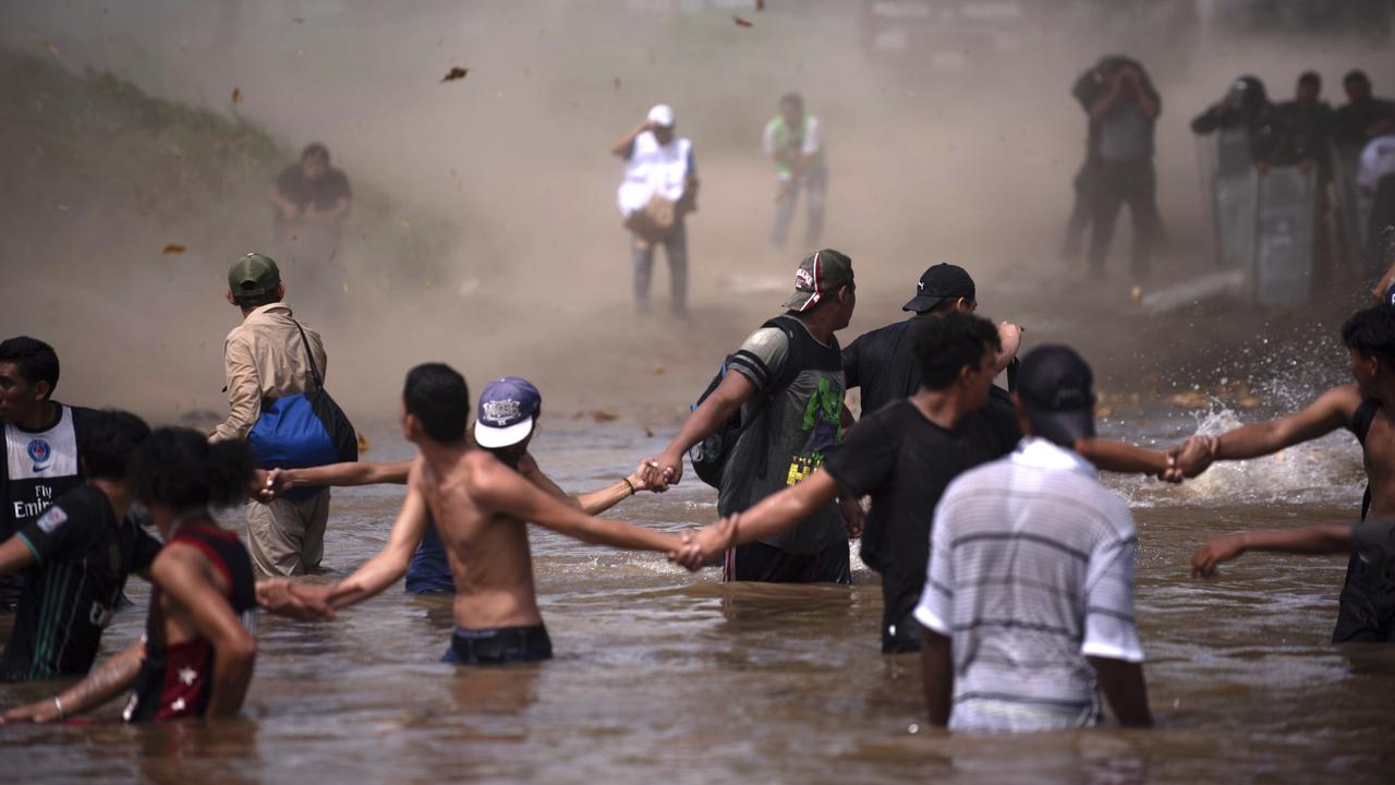 Incredible images have surfaced of Central American migrants trying to cross the US border. Picture: Santiago Billy/AP