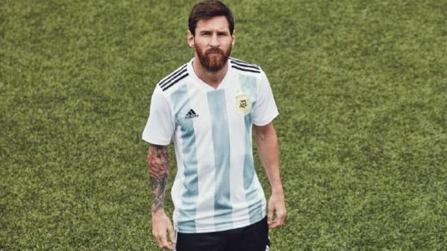 Lionel Messi models Argentina's classic look.