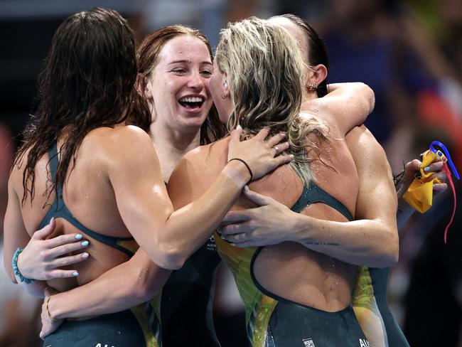 Mollie O'Callaghan celebrates with Lani Pallister, Brianna Throssell and Ariarne Titmus. Picture: Getty Images