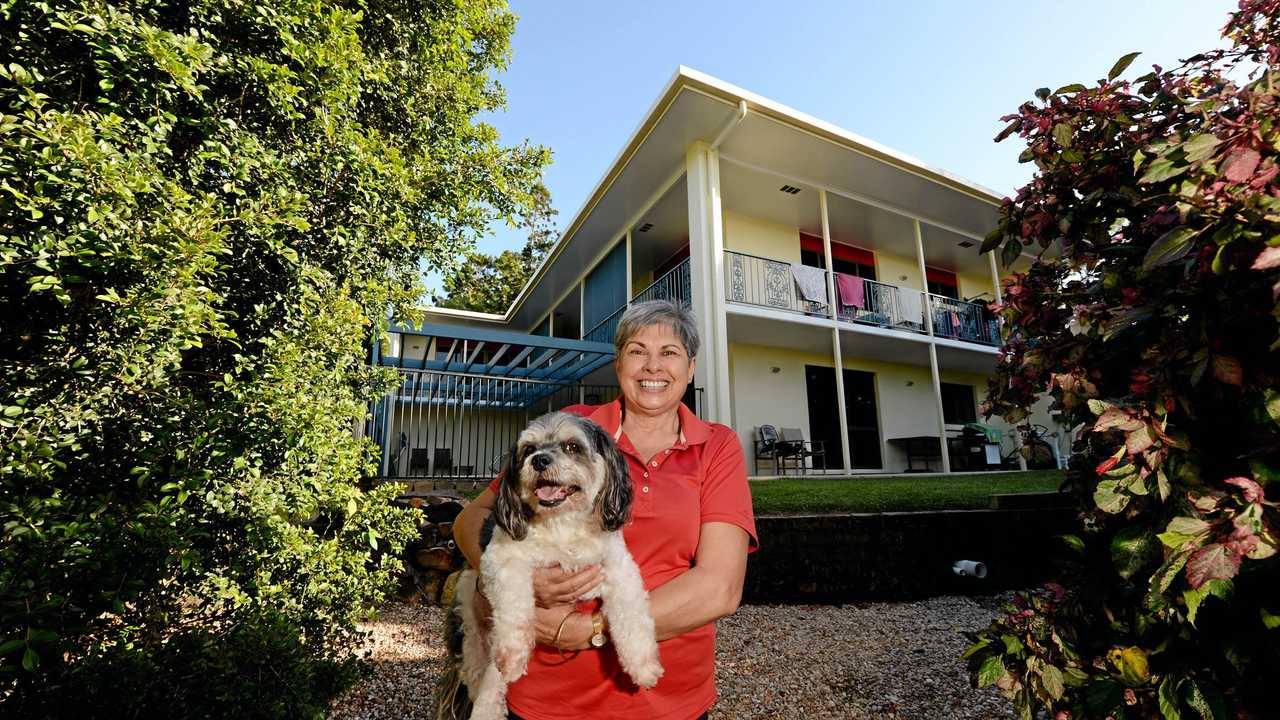 GOOD LOCALITY: Homeowner Margaret Scott with her dog Benji. Picture: Stuart Quinn