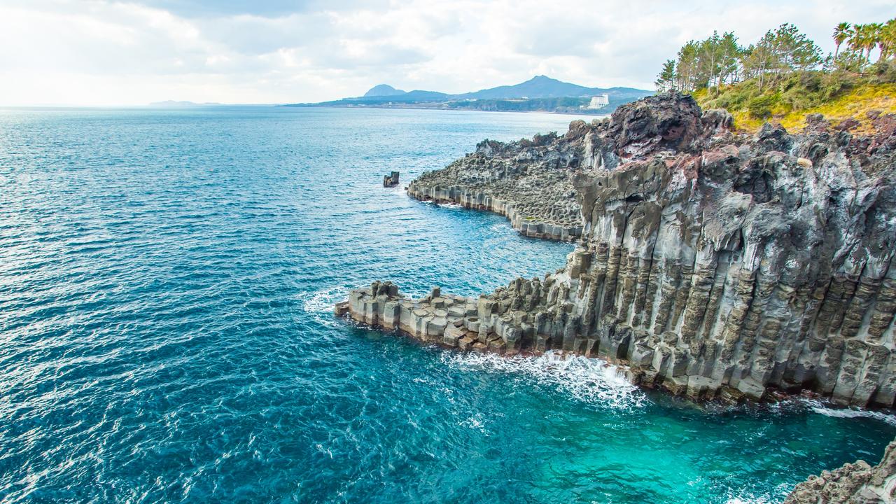 The rocky terrain of Jeju Island’s coastline in South Korea.