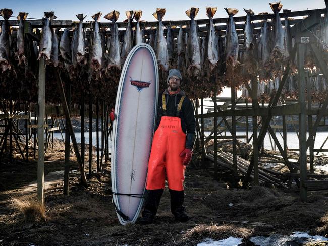 Nils Nilsen, 26, an employee in a fishing factory, poses on March 6, 2018, front of arctic cod in Henningsvaer, northern Norway, Lofoten islands, within Arctic Circle. Nils Nilsen, 26, an employee in a fishing factory “Surfing to me is peace of mind, quiet inside my head. One focus, that’s it. Of course it’s challenging yourself, I guess. Whatever the season, if I have the time, I’m in the water. I have been to Portugal a couple of times, up and down the coast.” Picture: AFP