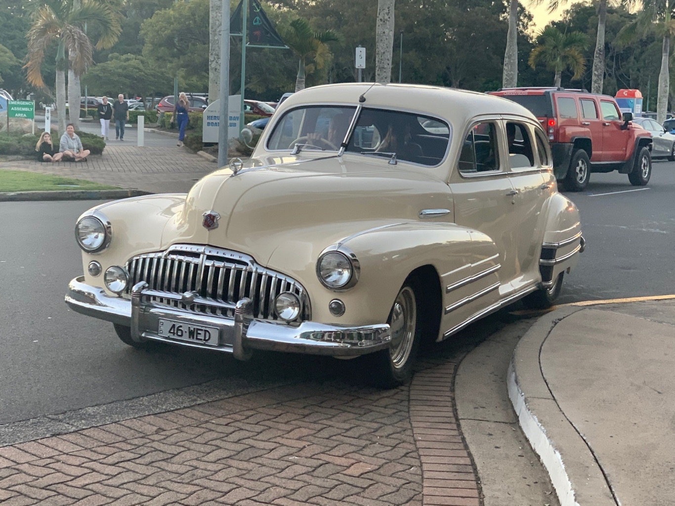 Mascha Bosnjak and Aiden Perrier arriving at the formal in style in a classic car.