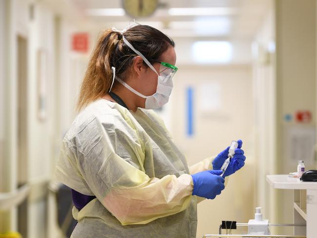 A healthcare worker in the coronavirus screening clinic at Cabrini private hospital in Melbourne. Picture: AAP