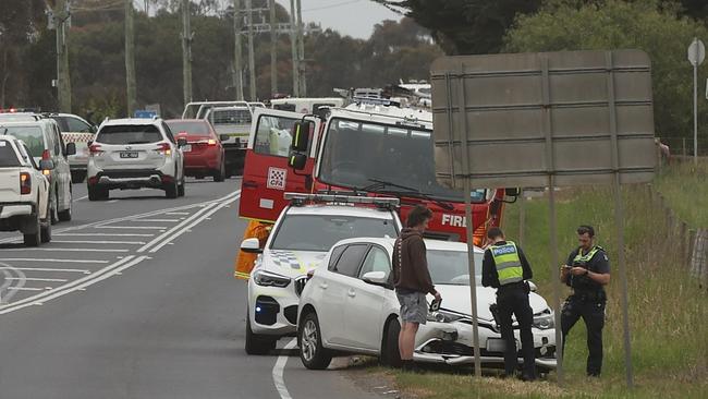 A car almost 1km away from the accident site of two other cars on the Hamilton Highway near the Fyansford-Gheringhap corner. Picture: Alison Wynd