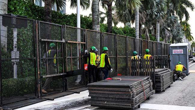 Workers erect security fencing outside the Palm Beach County Convention Center ahead of the election night watch party of former US President and 2024 Republican presidential candidate Donald Trump in West Palm Beach, Florida, on November 4, 2024. Picture: CHANDAN KHANNA / AFP