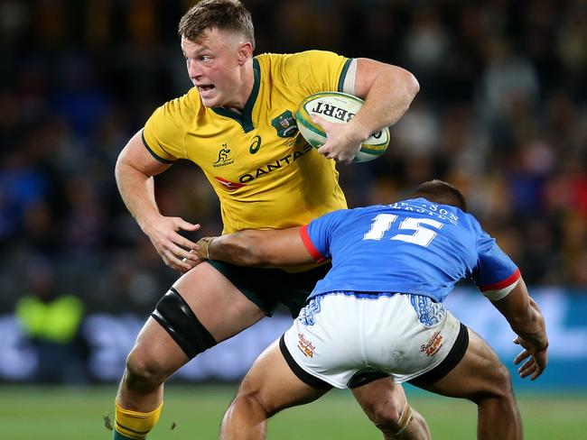 Jack Dempsey is tackled by Tim Nanai-Williams during the match between the Wallabies and Samoa at Bankwest Stadium on September 7.