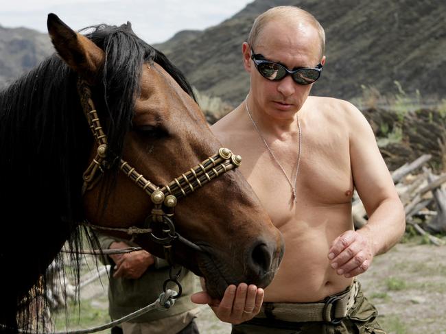 Strongman: Vladimir Putin goes shirtless on holiday in Kyzyl, southern Siberia, in 2009. Picture: AFP