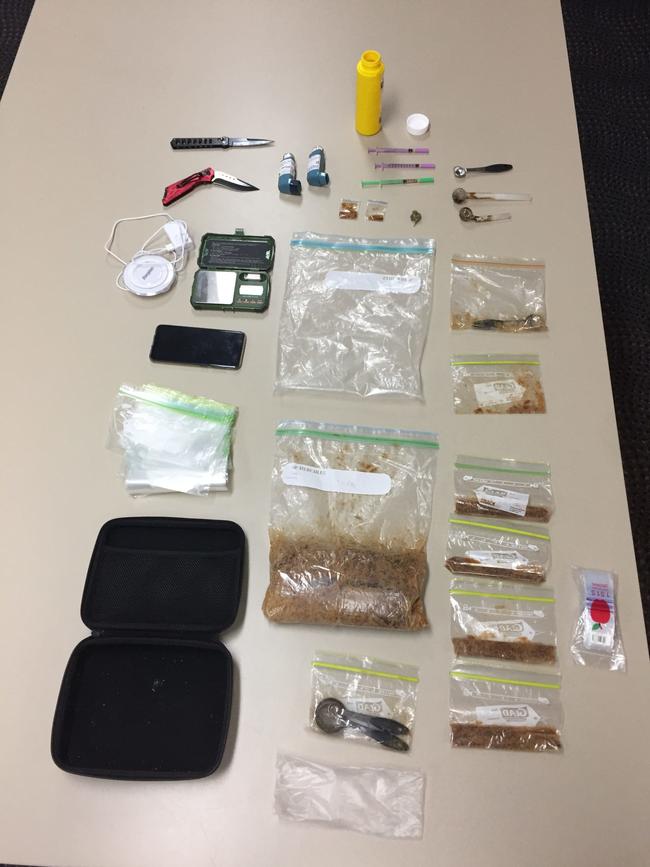 Drugs and items uncovered during a police search in Airlie Beach.