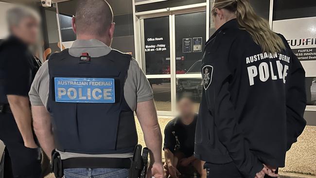 The AFP arrest a man in Darwin in relation to a Columbian-based organised crime group.