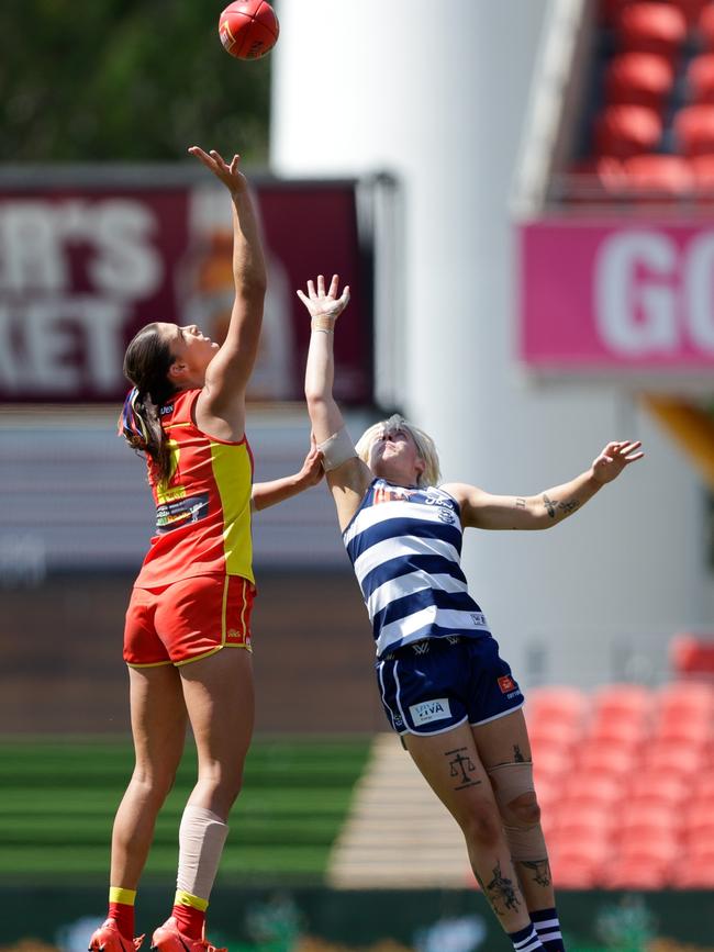 Geelong’s Gabbi Featherston (right) goes up against Gold Coast’s Lauren Bella in the ruck. Picture: Russell Freeman/AFL Photos via Getty Images)